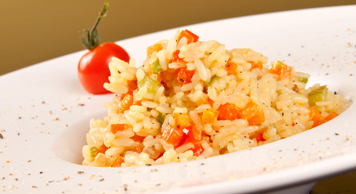 Risotto mit Zucchini und rotem Paprika